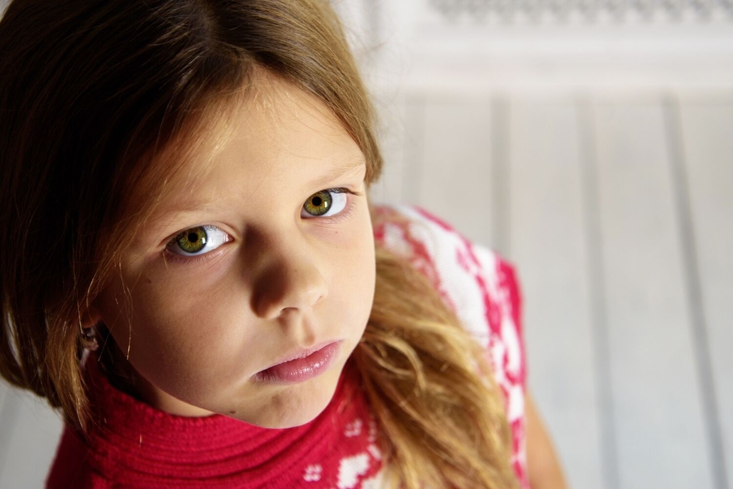 Portrait of a little girl sad emotion 1200x801