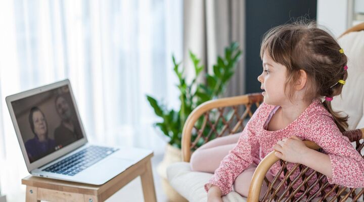 Child Talking To Grandparents On Laptop