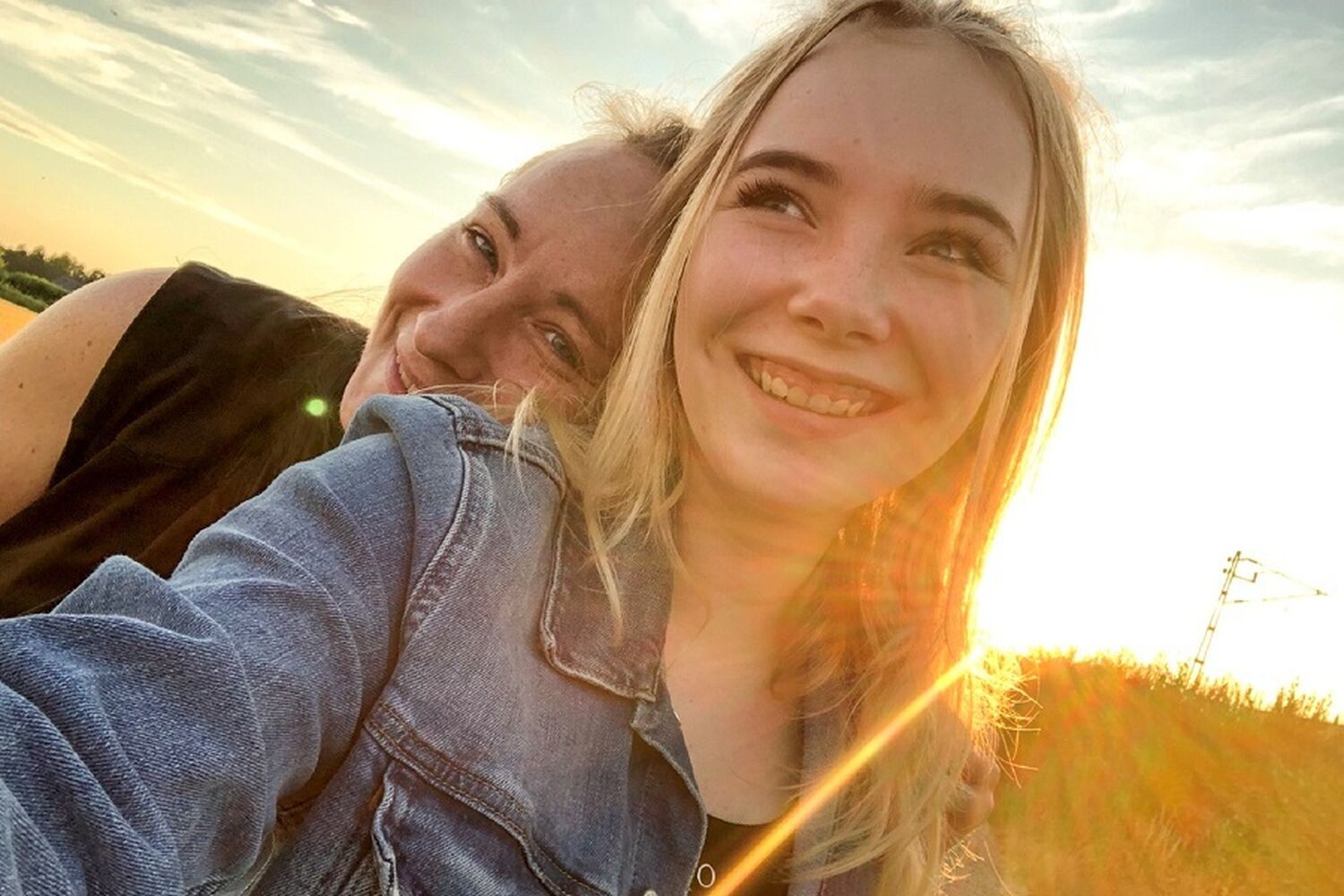 Mother And Daughter Selfie During Sunset