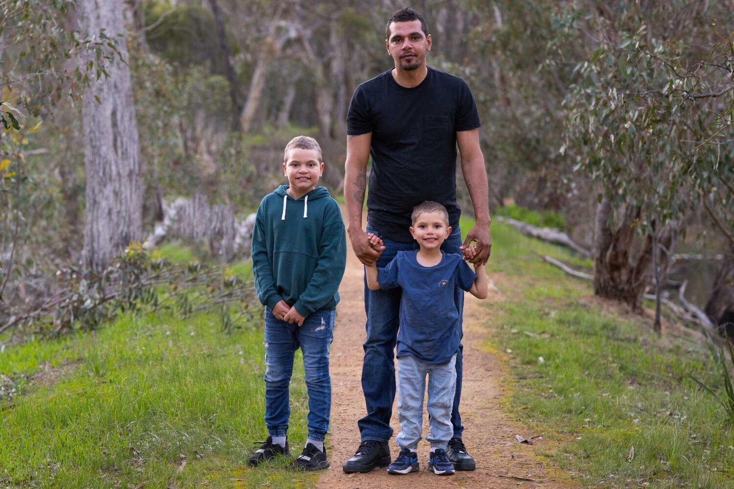 Aboriginal man and his two sons